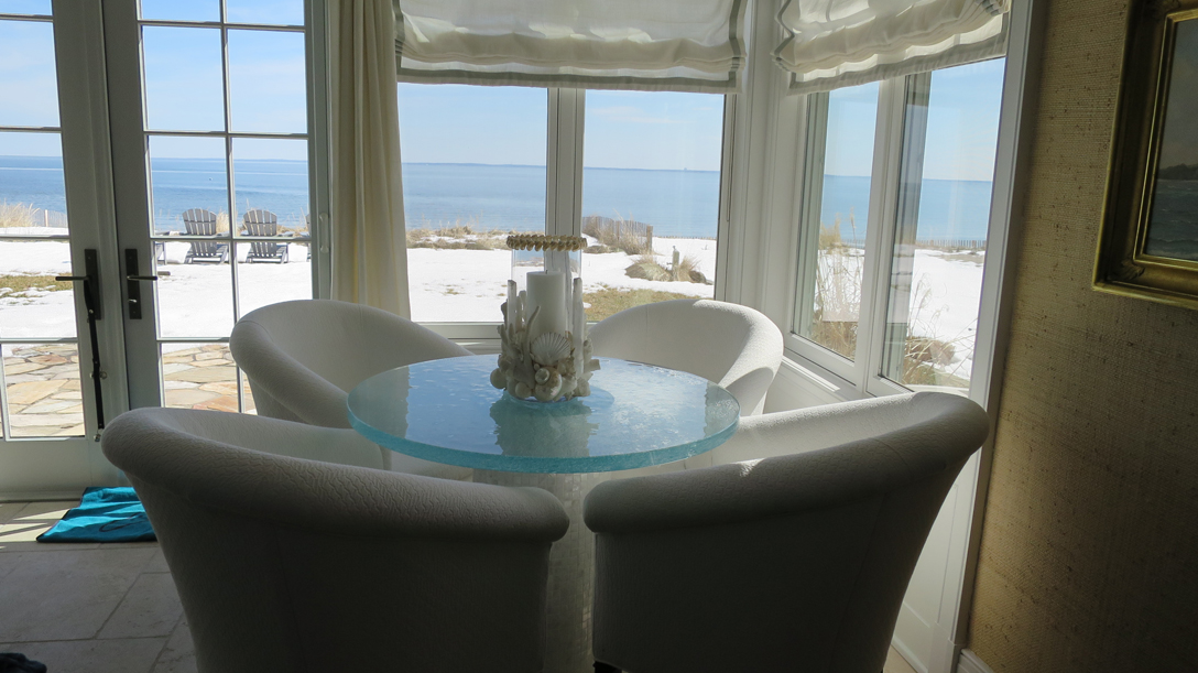 Seating area takes advantage of beach view. 