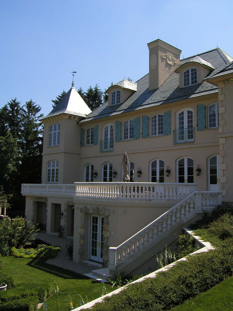 Rear of house has large terrace off main floor to maximize views. 