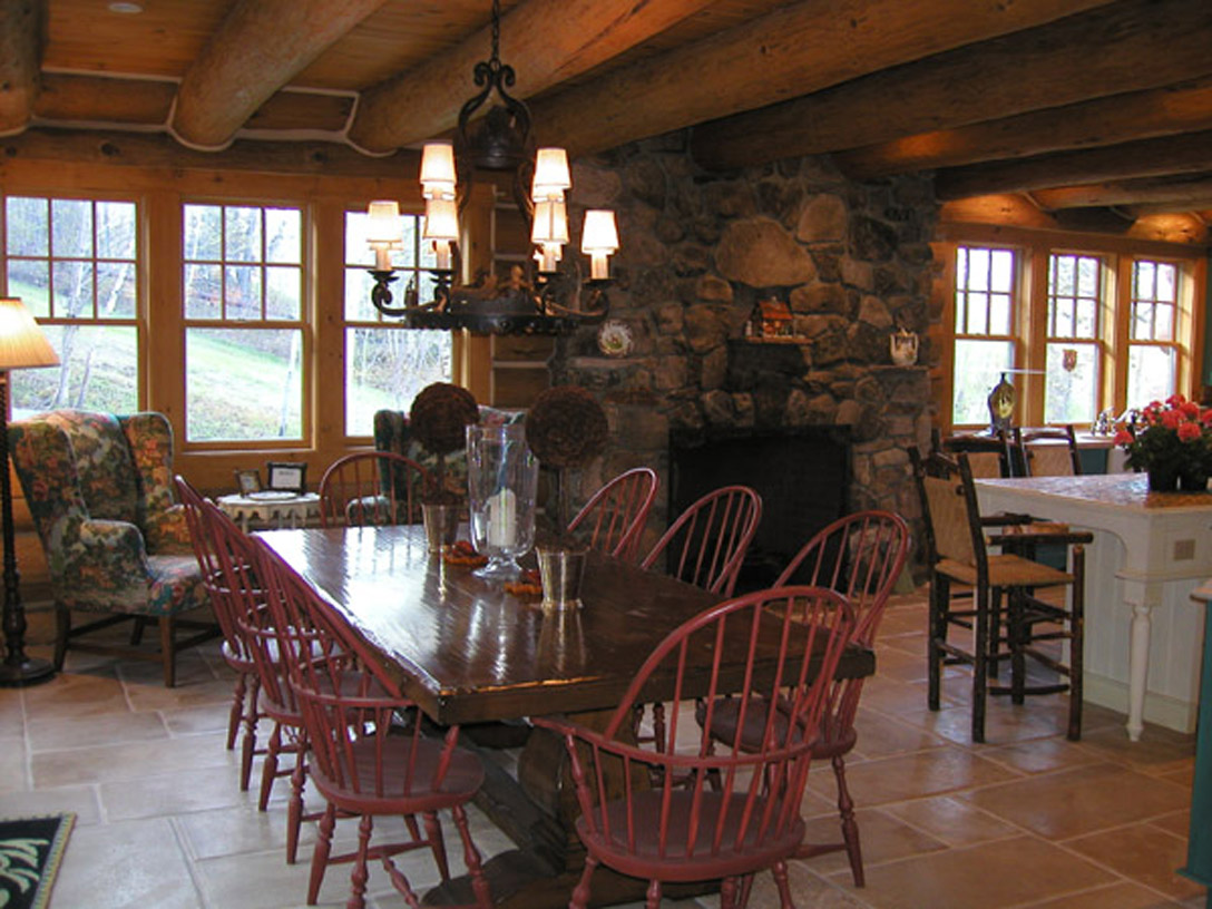 Kitchen table and sink area facing ski run. 