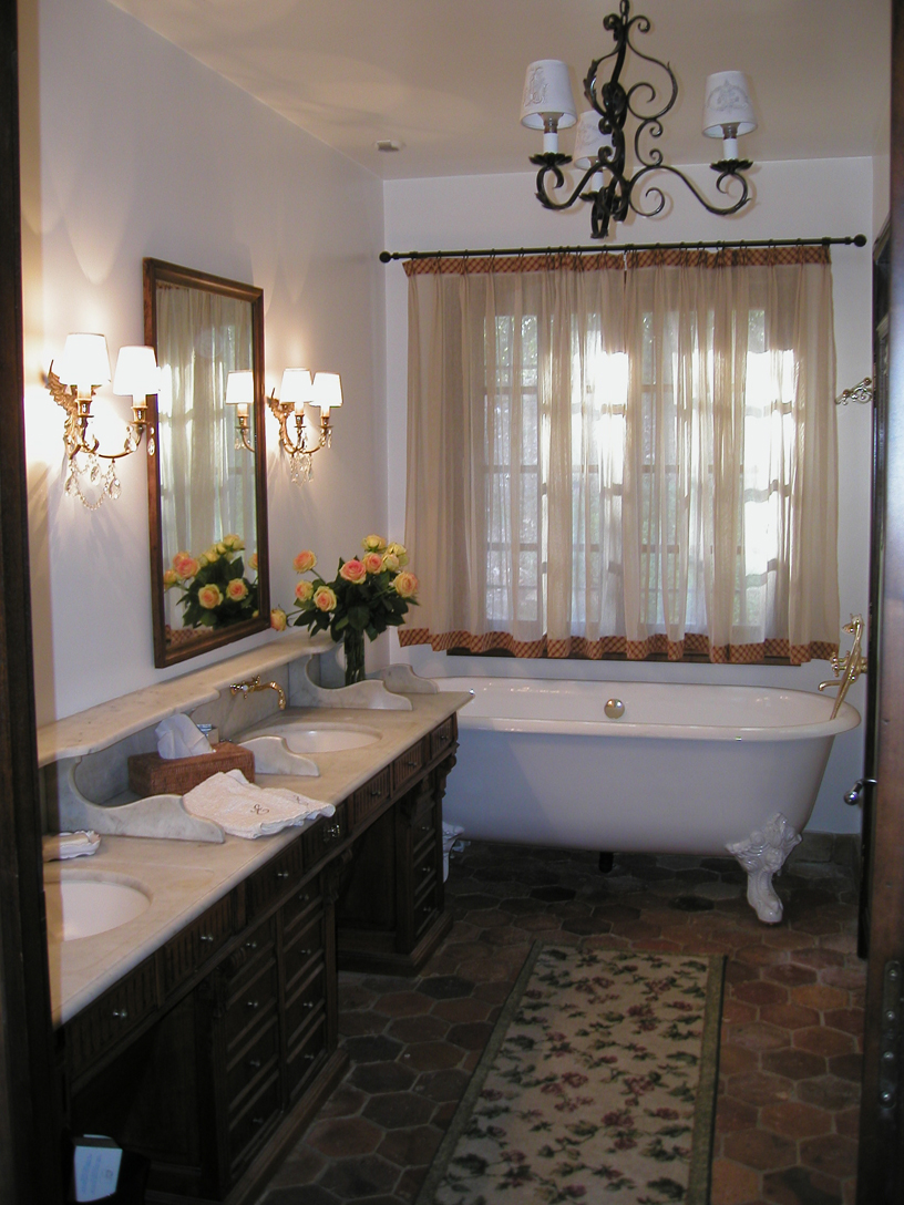 Master bath with antique fittings.